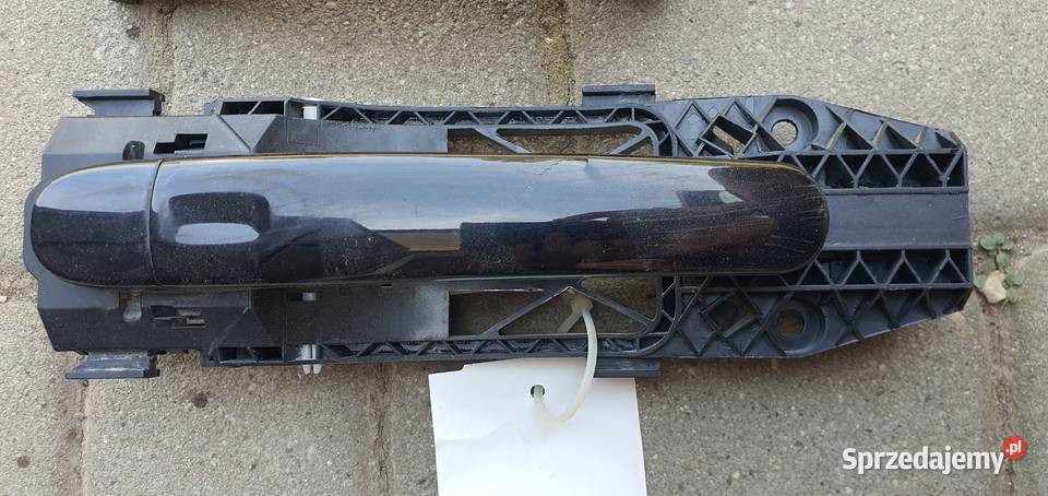 VW TIGUAN 2014r zaślepki dekle przednich lamp