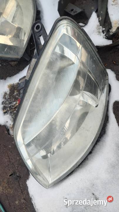 Reflektor lampa lewa prawa przód przednia Książ Wielkopolski