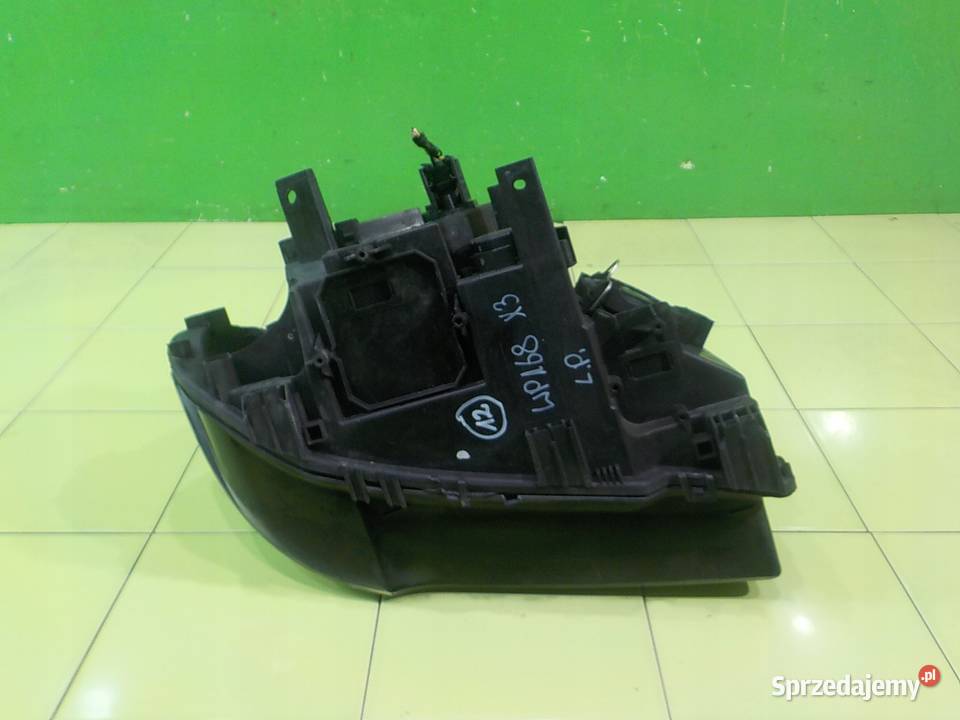 BMW X3 E83 25 B AUT 06r lampa lewa przod osobowe Suków