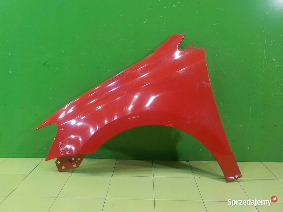 VW POLO V 6R 12 B 11r blotnik lewy przod Suków