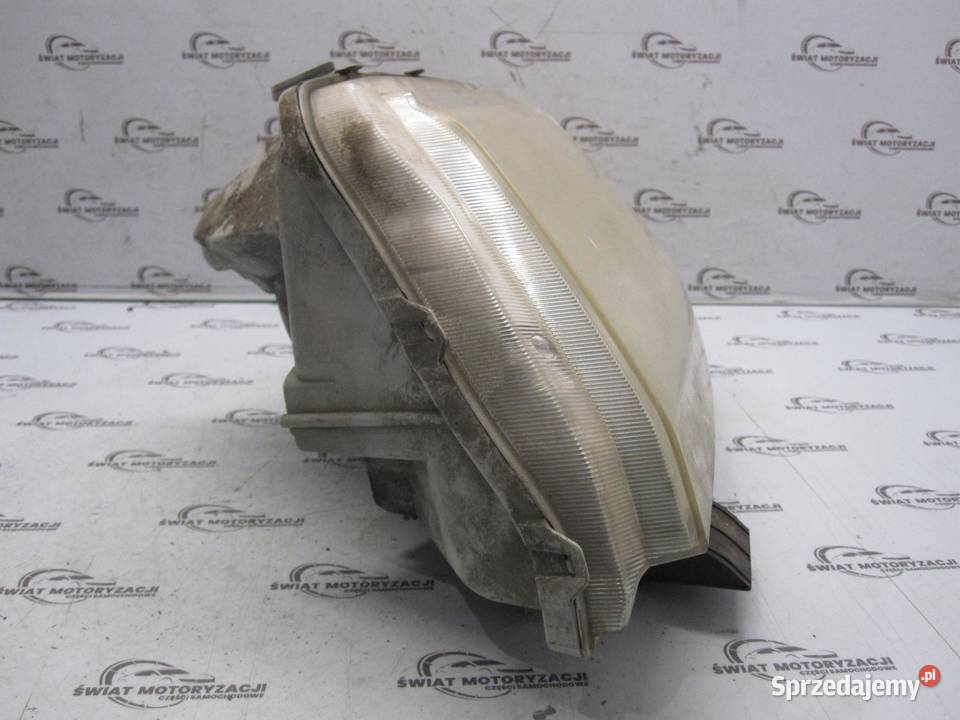 SUZUKI GRAND VITARA II 06r lampa lewa przód