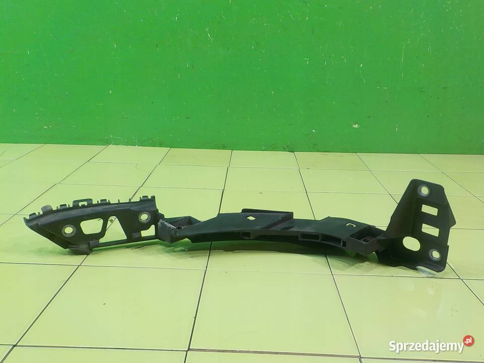 VW POLO V 6R 14 B 11r slizg pod lampe lewy przod