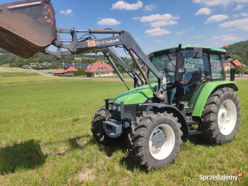 Holland TL90 ładowacz czołowy niski przebieg New Holland Tyczyn