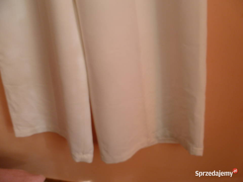 Spodnie białe b szerokie Kraków