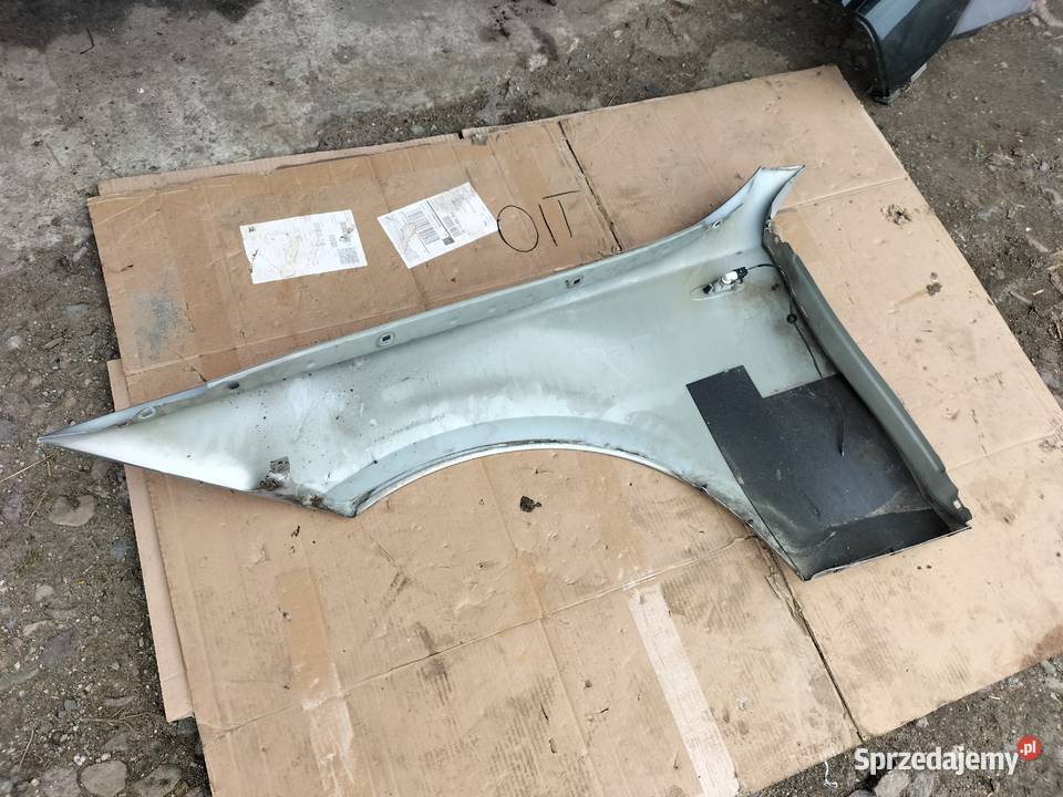 BMW 1 E87 BŁOTNIK PRAWY PRZÓD SIWY sprzedam