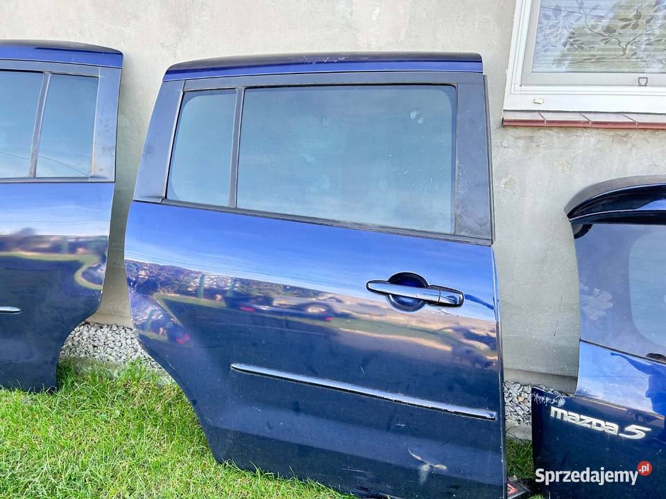 Drzwi komplet mazda 5 2010 Ląd-Kolonia