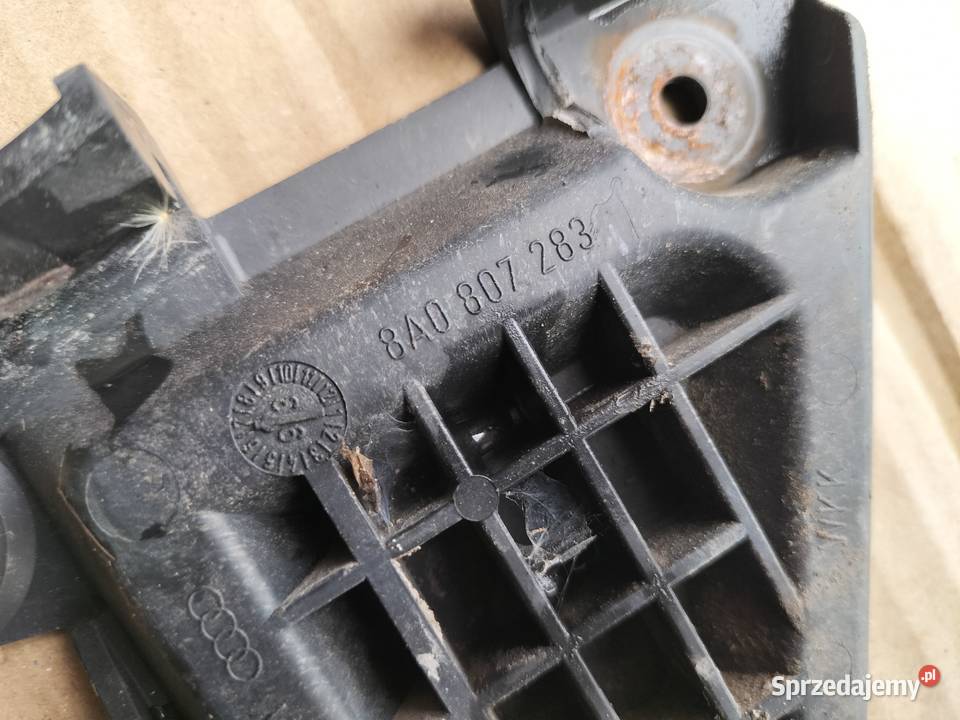 AUDI 80 B4 80B4 UCHWYT ZDERZAKA PRZÓD PRZEDNIEGO osobowe Kamień-Kolonia