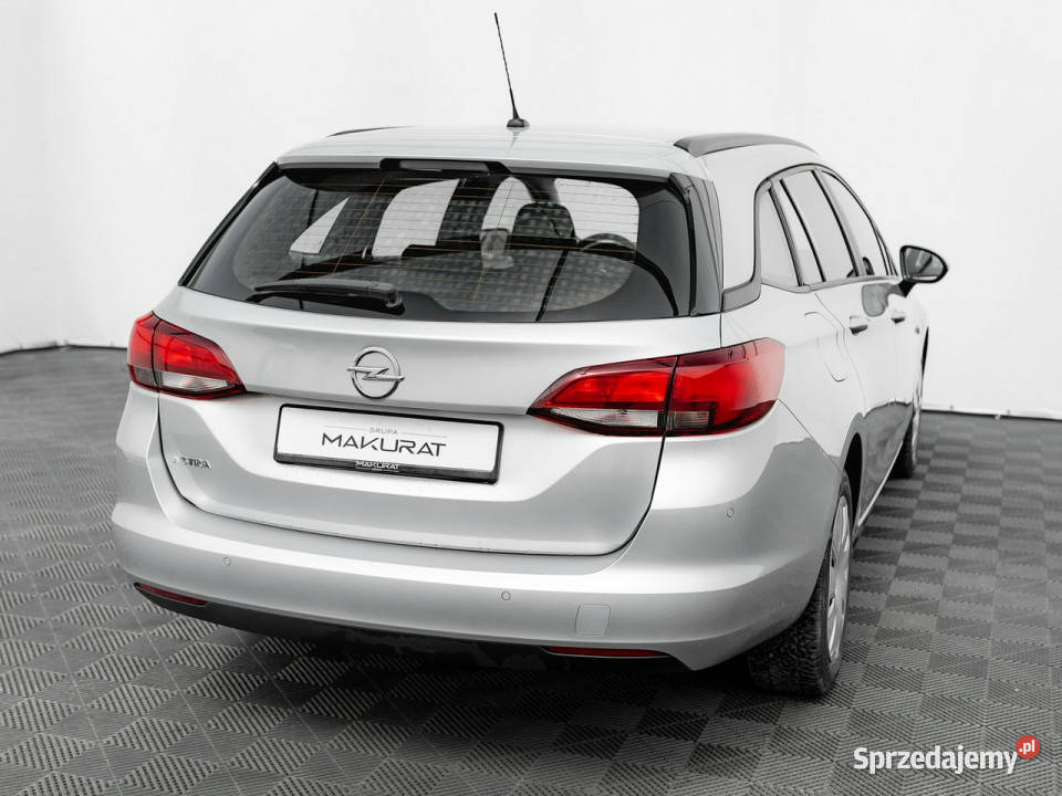 Opel Astra WD3487R16 CDTI Enjoy Czpark Salon srebrny Samochody osobowe Gdańsk sprzedam