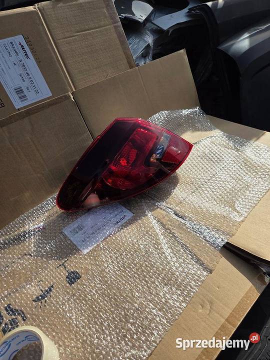 Lampa lewa lewy tył tylna Opel Meriva B 13410927 Lampy tylne