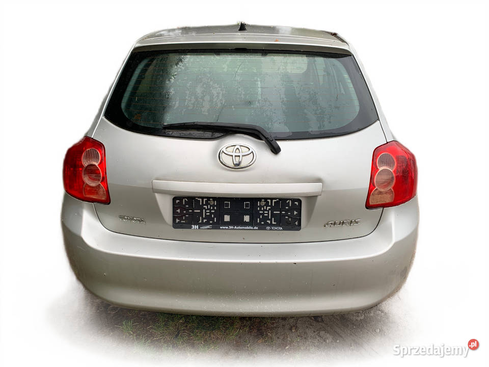 Toyota Auris I E15 0612 Klapa tylna kolor 1C0 Białogard