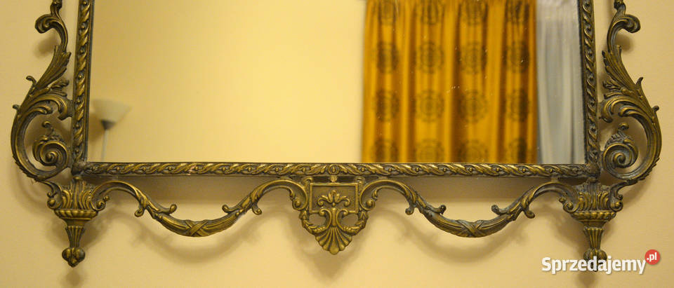 Lustro z metalową odlewaną rokokową ramą Ostrzeszów