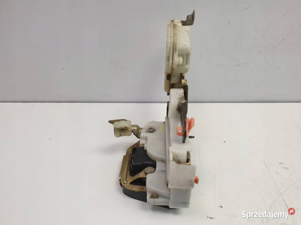 Nissan Almera N16 ZAMEK DRZWI Lewy tył kierowcy Rudka