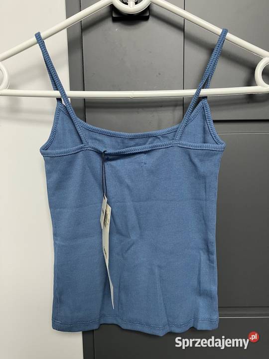 niebieski top na ramiączkach z napisem xxs 32