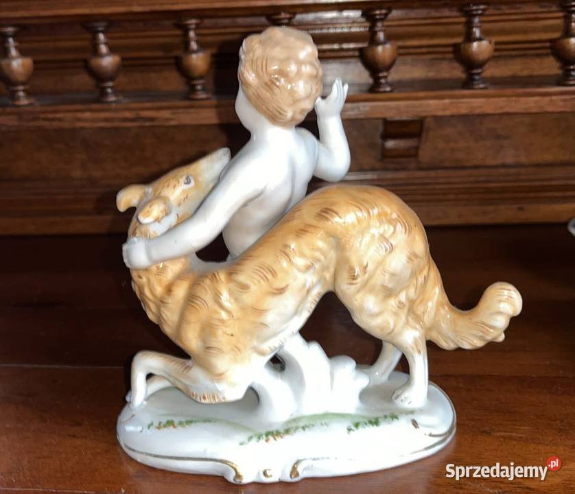 Figurka Putto z chartem Syg Import Gdańsk