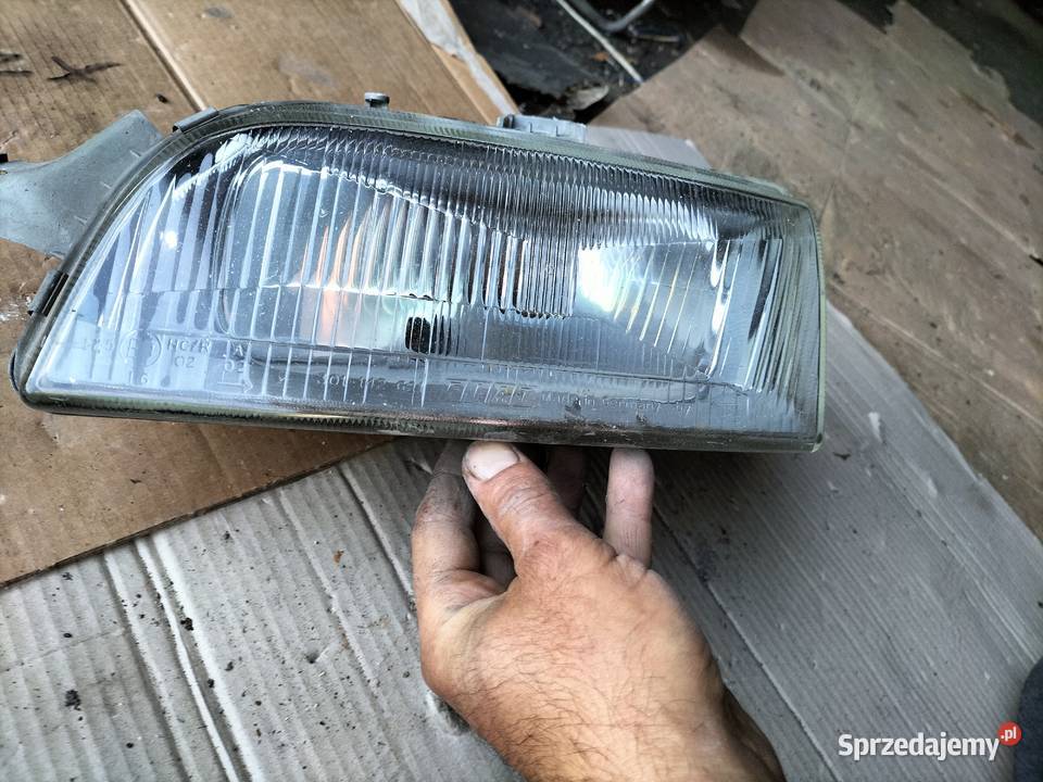 LAMPA PRZÓD PRZEDNIA LEWA REFLEKTOR FIAT PUNTO 1 Kamień-Kolonia