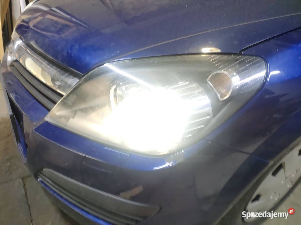 reflektory opel astra h