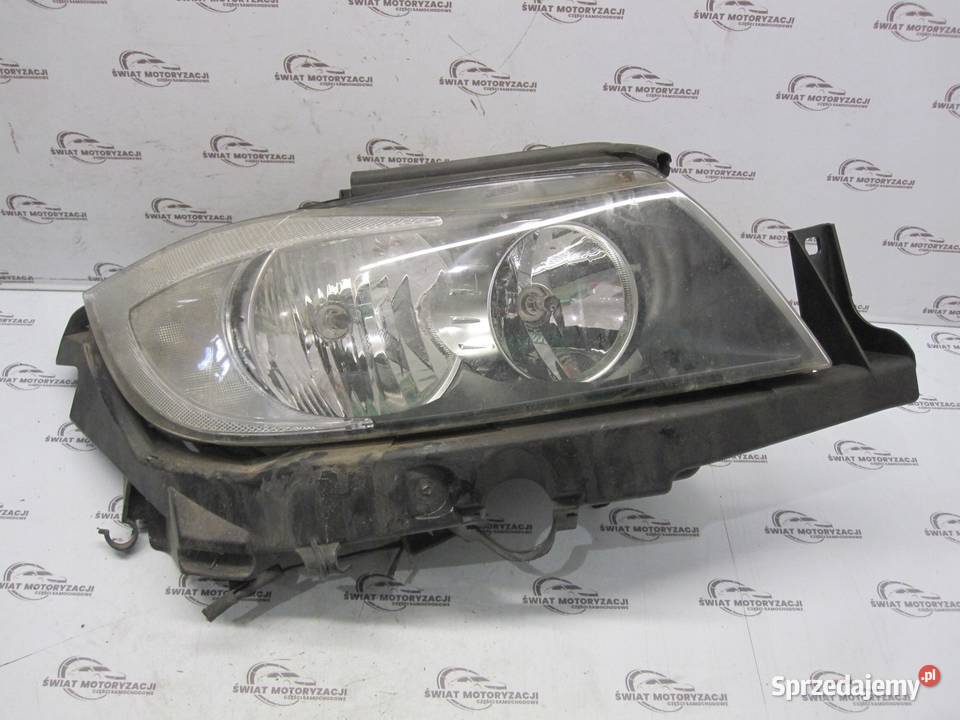 BMW E91 06r lampa prawa przód 6942724 ANGLIK Lampy przednie