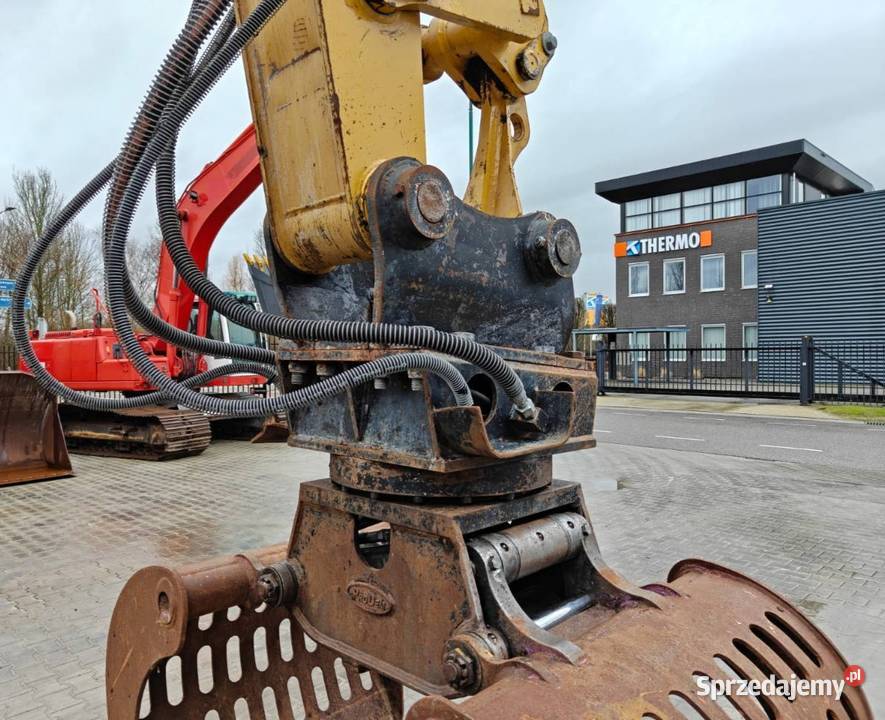 Koparka kolowa przeladunkowa Caterpillar M 318 D Warszawa sprzedam