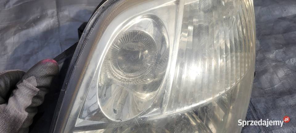 KIA PICANTO I 0407 LAMPA PRZÓD LEWA REFLEKTOR osobowe Części samochodowe Ruda Śląska