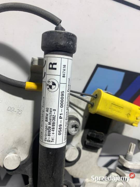 BMW F10 F11 ZAWIAS MASKI PRAWY NABÓJ ORYGINAŁ osobowe