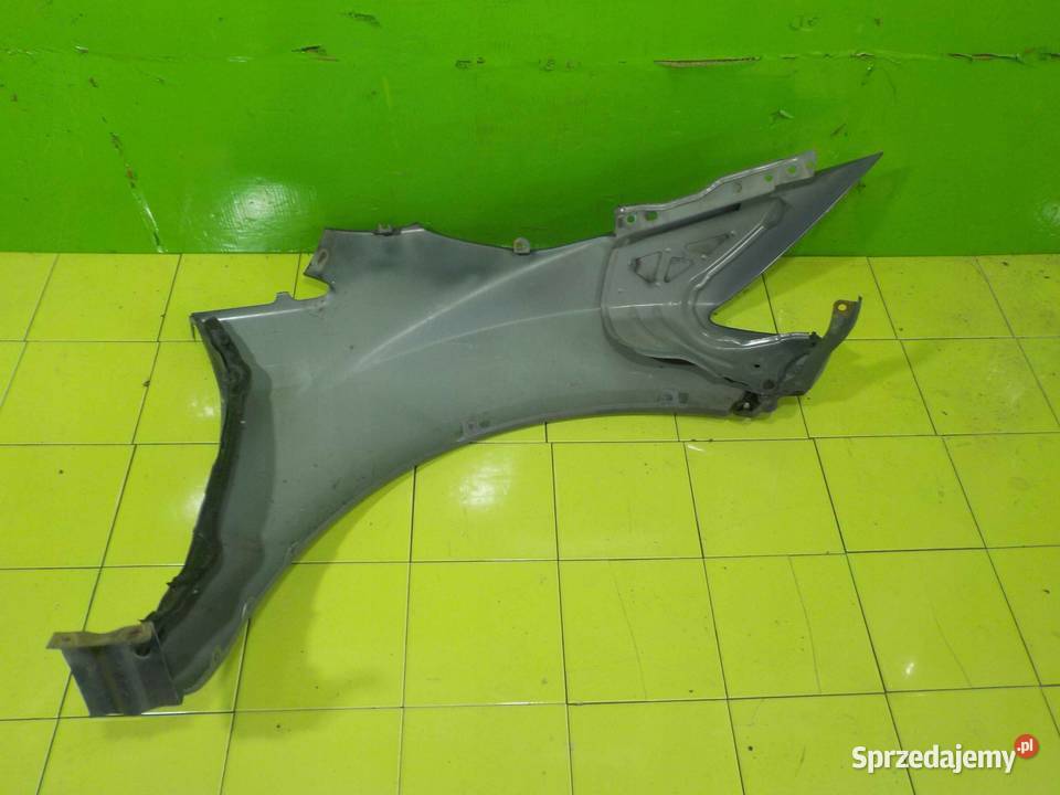 MAZDA CX7 08r blotnik lewy przod Suków