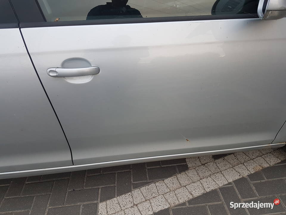 VW GOLF V KOMBI JETTA DRZWI PRAWE PRZOD SREBRNE Drzwi Turek sprzedam