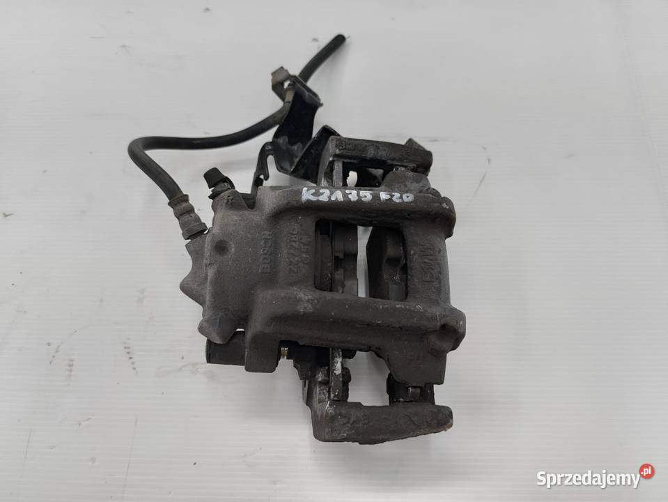 ZACISK LEWY PRZÓD BMW F20 F21 116i