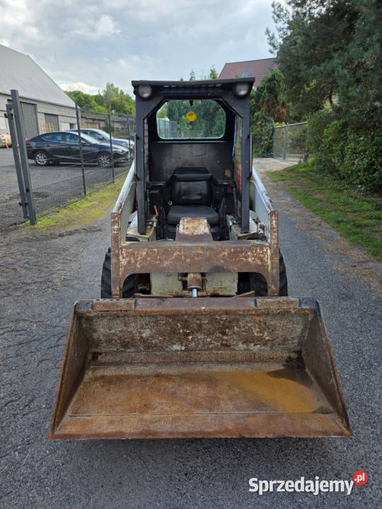 Miniładowarka Bobcat 643 łyżka i widły w nie Owczary