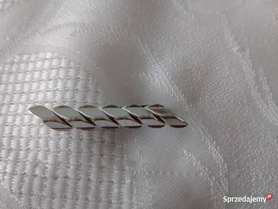 BROSZKA metalowa o srebrnym połysku z tłoczeniem wielkopolskie