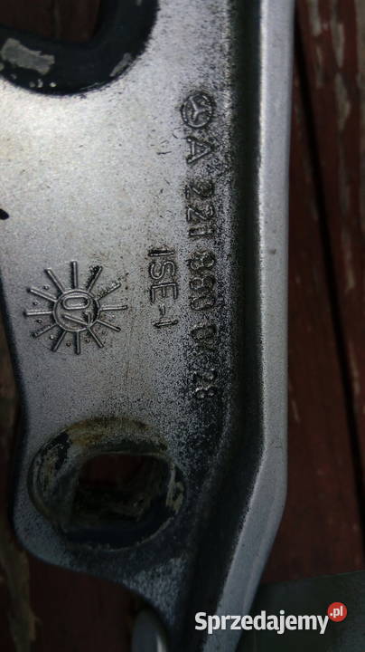 Zawias maski prawy Mercedes w 221 lak 775 EU Tarnów