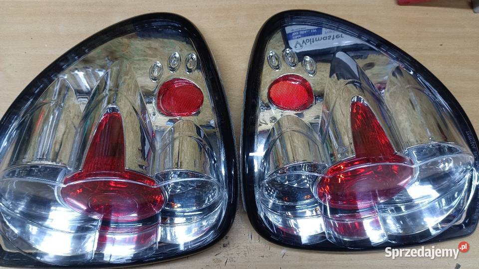 Lampy tył nowe Chrysler Voyager 0107 Dodge Grand