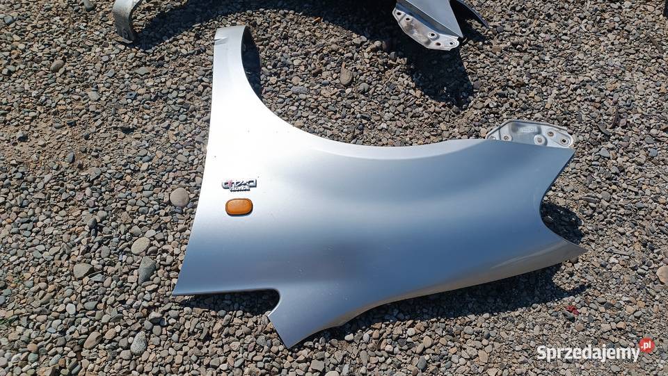Błotnik prawy lewy przedni przód Toyota Avensis Radłów