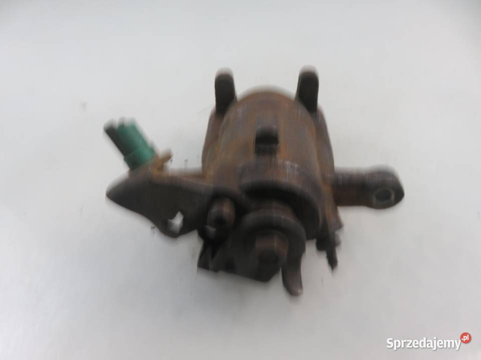 ZACISK LEWY TYŁ RENAULT KANGOO Express II