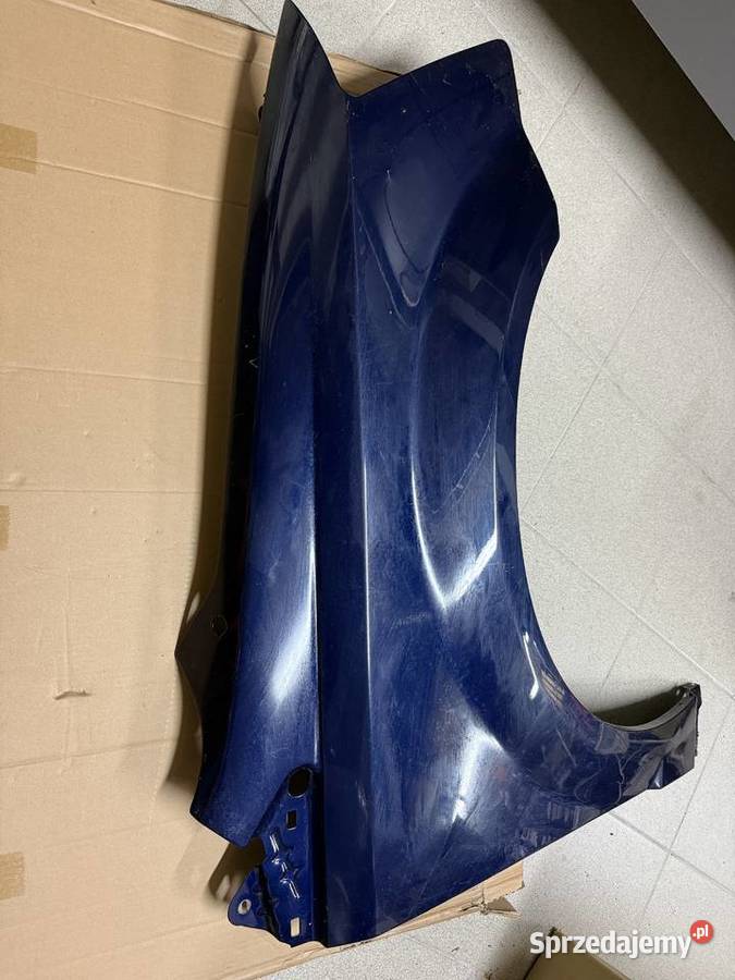 Błotnik prawy przód Dodge Grand Caravan oryginał podkarpackie Kolbuszowa Dolna