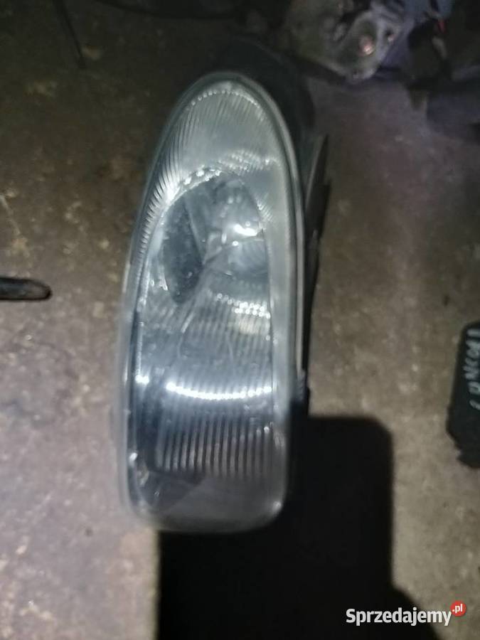 CHRYSLER TOWNCOUNTRYDODGE CARAVAN HALOGEN 0107 R Części samochodowe Kawnice sprzedam
