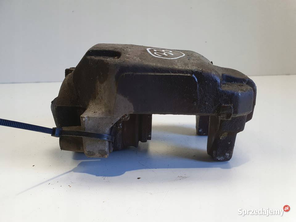 BMW E90 LEWY PRZEDNI ZACISK HAMULCOWY przód Rudka