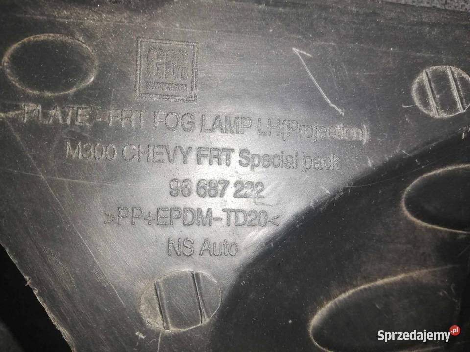 CHEVROLET SPARK M300 osłona halogenu ramka