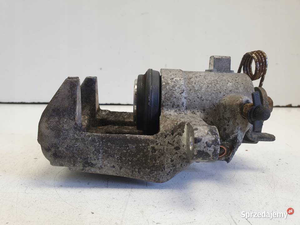 VW Golf IV LEWY ZACISK HAMULCOWY tył KIEROWCY Janów