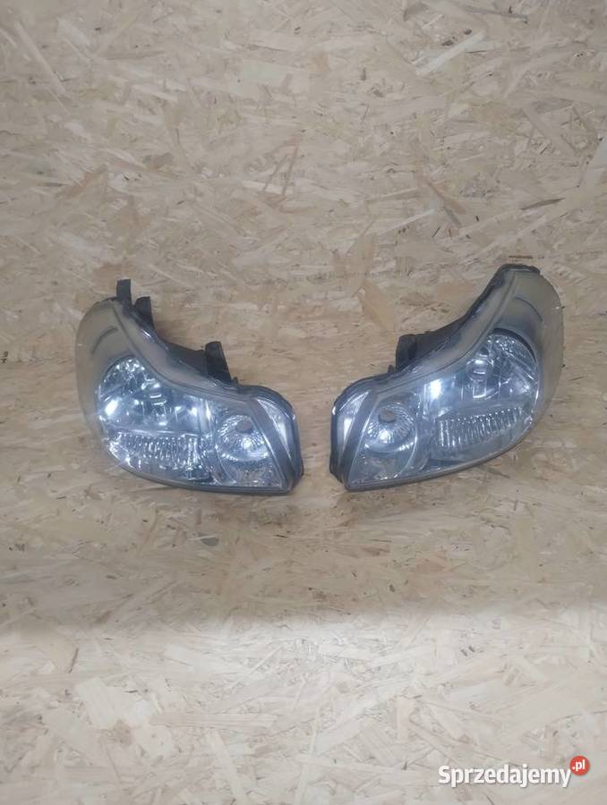 Lampy przód Suzuki SX4 oryginał Jodłownik