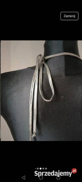 Elegancka sukienka srebna wyeksponowane plecy Spódnice i sukienki Krosno