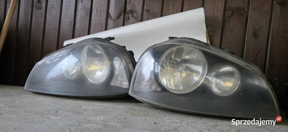 Lampy przód i tył arosa 2002r polift Kosin