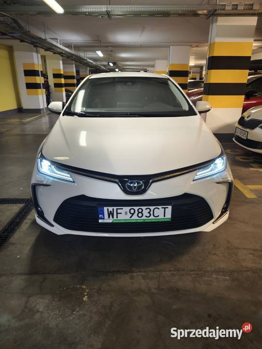 Toyota Corolla Sedan 2021 Comfort + Style E21 1.8 Hybrid 122 KM Salon PL