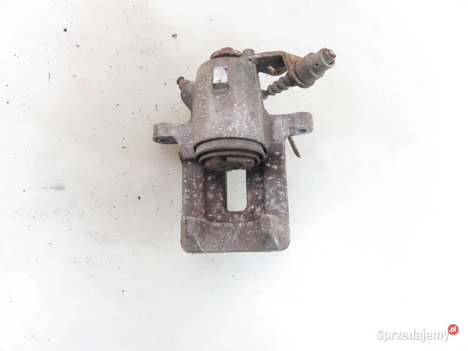 ZACISK PRAWY TYŁ SKODA OCTAVIA 19 TDI