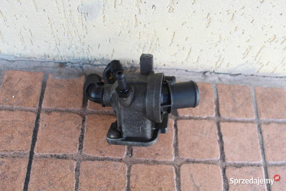 OBUDOWA TERMOSTATU OPEL CORSA D 13 CDTI 55224022 wielkopolskie
