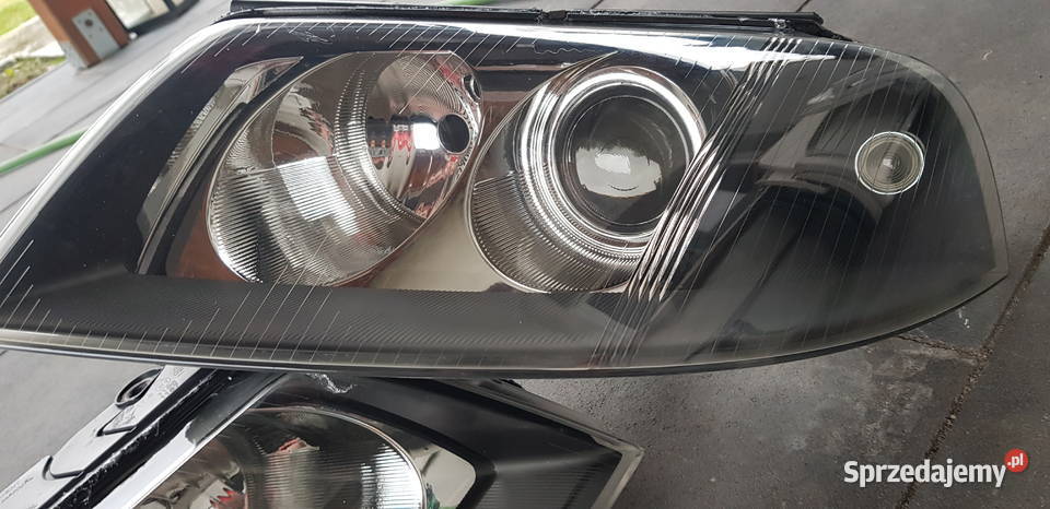 Reflektory Lampy VW Passat B5 fl HELLA soczewka