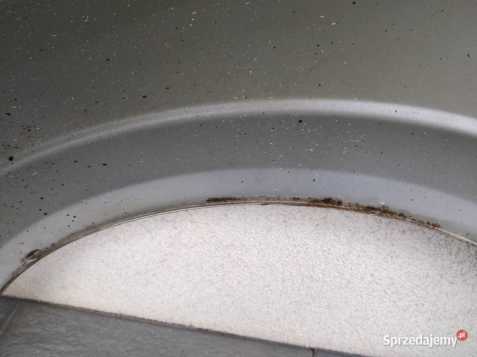 Opel Astra H błotnik przedni prawy srebrny Z157 Sieradz