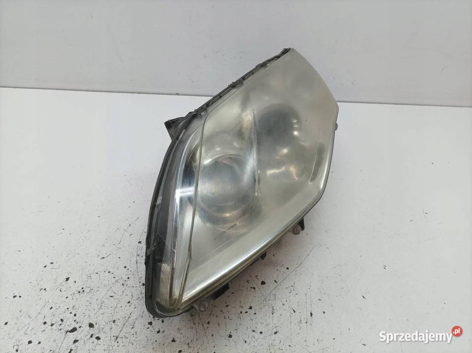 LAMPA PRZÓD LEWA SOCZEWKA H7 89901834 Renault osobowe Lampy przednie