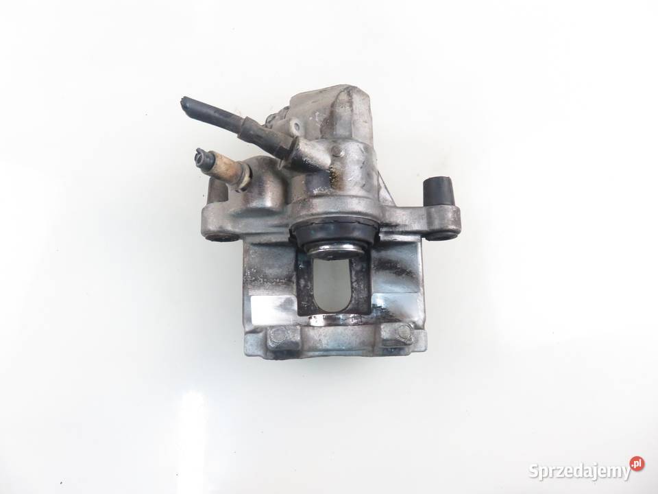 ZACISK LEWY TYŁ FORD FOCUS MK2 II Turnier