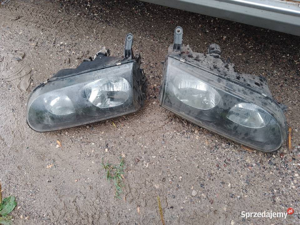 Reflektor lampa MITSUBISHI SPACE GEAR L400 Oświetlenie Zgierz