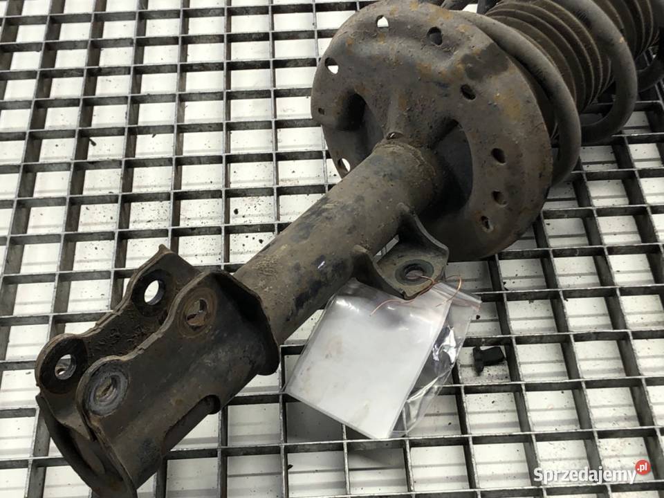 AMORTYZATOR LEWY PRZÓD ZE SPRĘŻYNĄ OPEL CORSA D